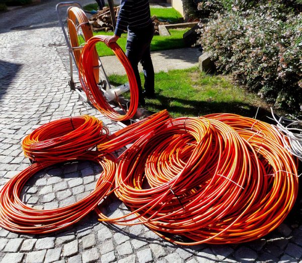 reams of fibre optic cables on the surface uk