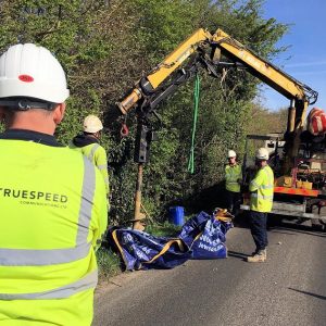 truespeed fibre optic cable install on road