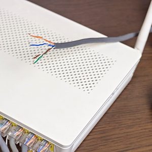 On the table, the network cable and modem, router