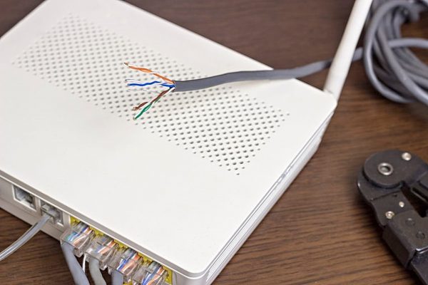 On the table, the network cable and modem, router