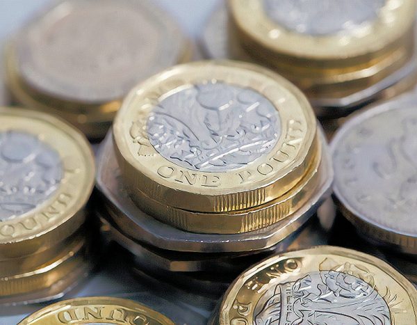 pound coins pile uk