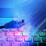 fibre optic cables and computer keyboard 2020 via 123rf