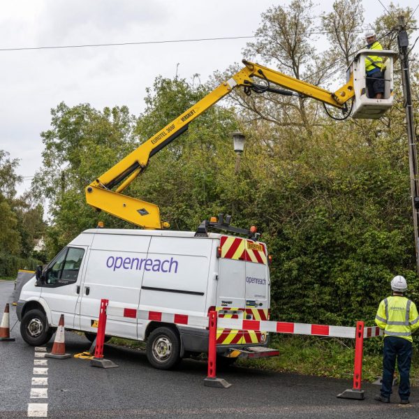 van_and_openreach_fttp_engineer_on_telegraph_pole_photo