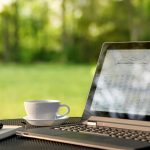 computer on outdoor table 123rf