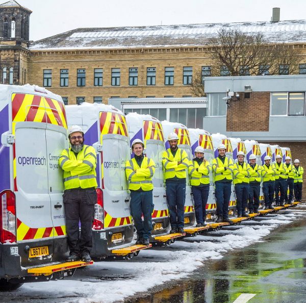 openreach engineer uk team and vans in snow