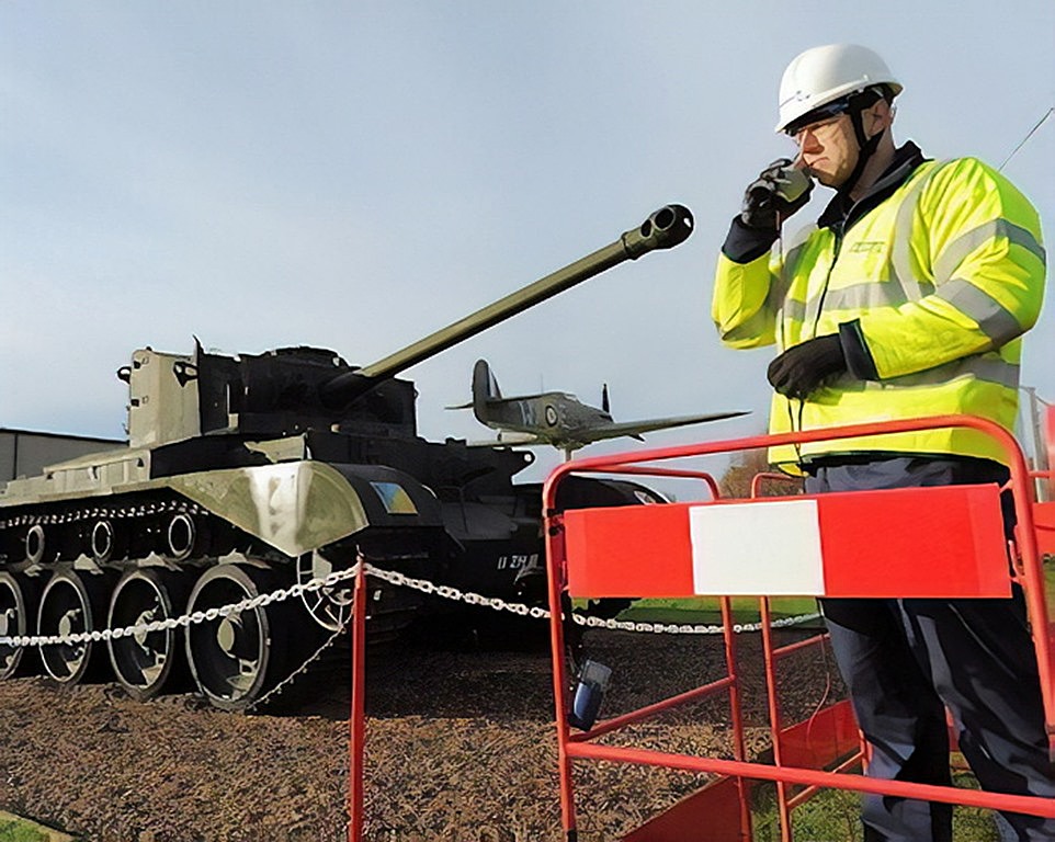tank pointing at bt openreach engineer long