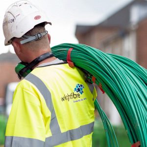 wightfibre engineer with ftth cable