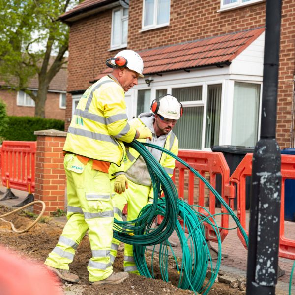 Virgin Media O2 Engineers Holding Fibre Cables