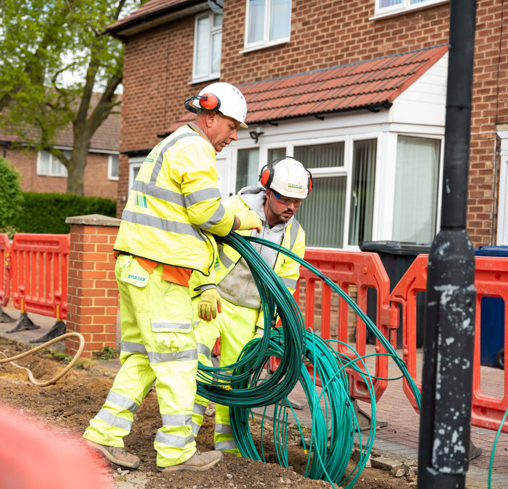 Virgin Media O2 Engineers Holding Fibre Cables