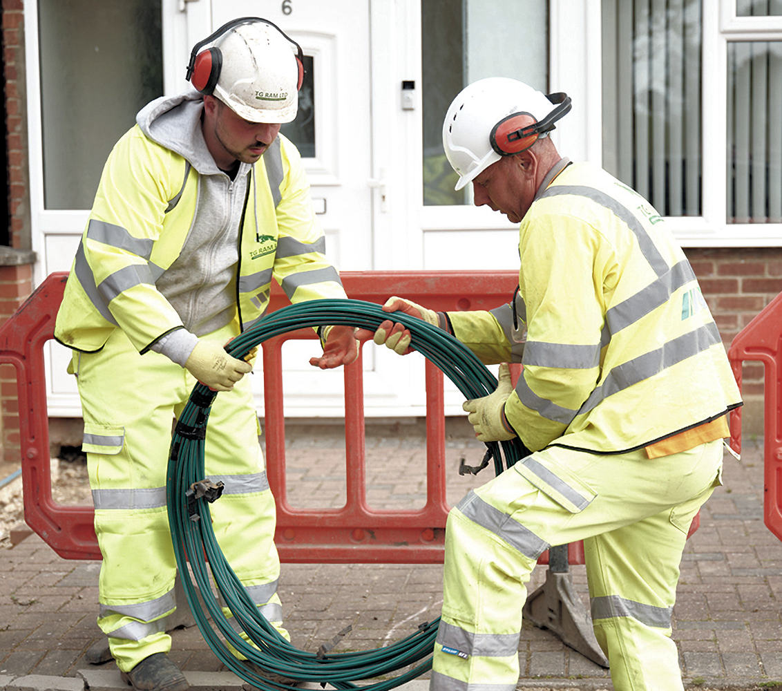 Virgin Media O2 Engineers Holding Optical Fibre Cable