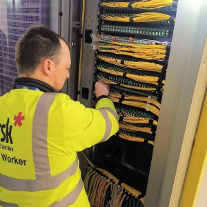 Brsk Engineer Working on Racks