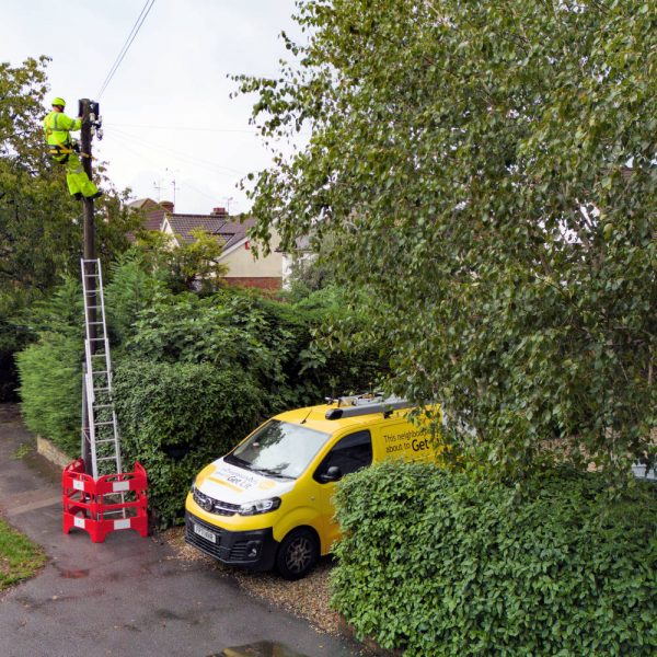 Lit Fibre Engineer up a Pole