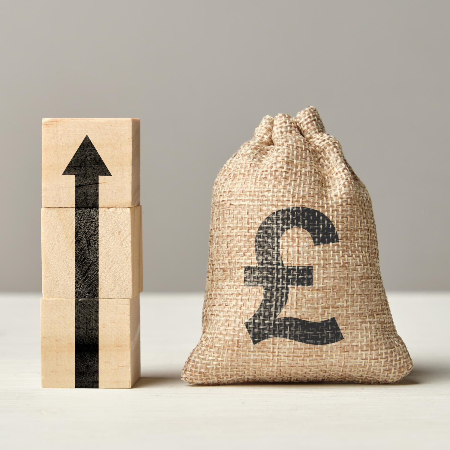 Pound sterling currency growth concept with up arrow and money bag