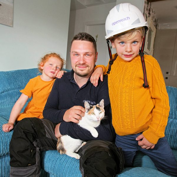 Openreach Engineer with Tia the Cat and Children