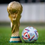 September 3, 2022, Doha, Qatar. FIFA World Cup and official Adidas Al Rihla ball on the green lawn of the stadium by 123rf