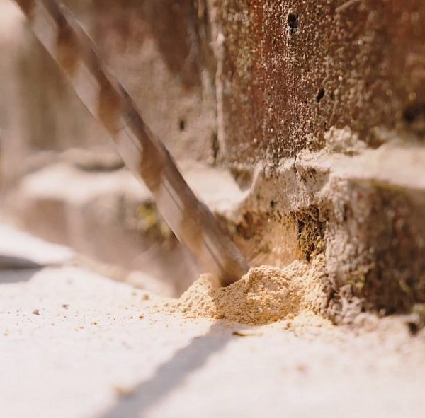 Zzoomm-Drilling-Hole-for-Fibre-in-Brick-Wall