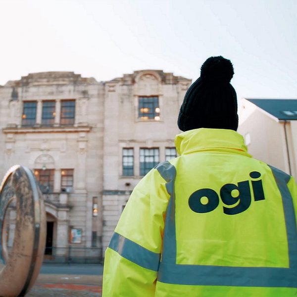 Ogi Engineer Standing in Front of Building