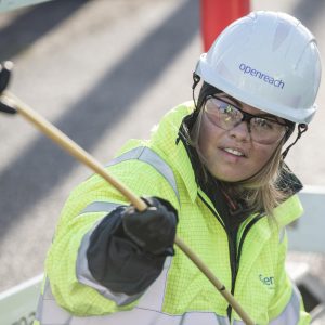 Female Engineer Pulling Fibre Cable