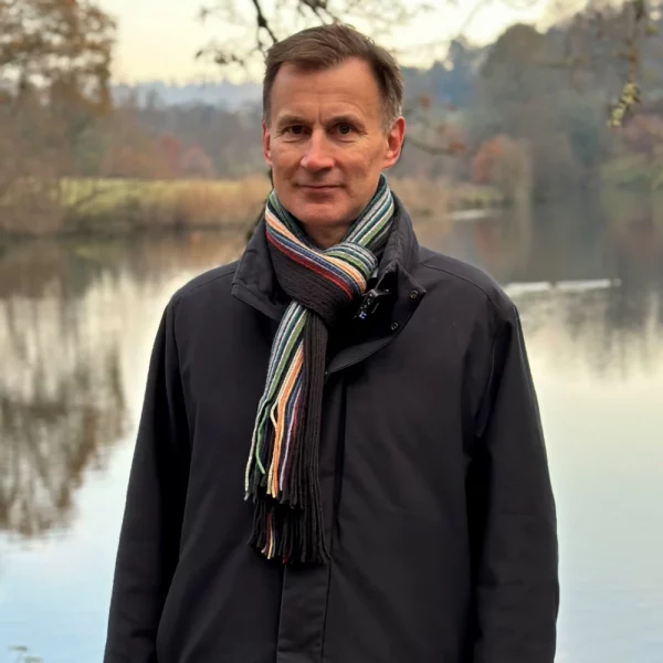 Jeremy Hunt UK MP Standing Outside Next to Lake