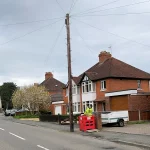 Gig-ability engineer points at telecoms pole for FTTP - PR 080424
