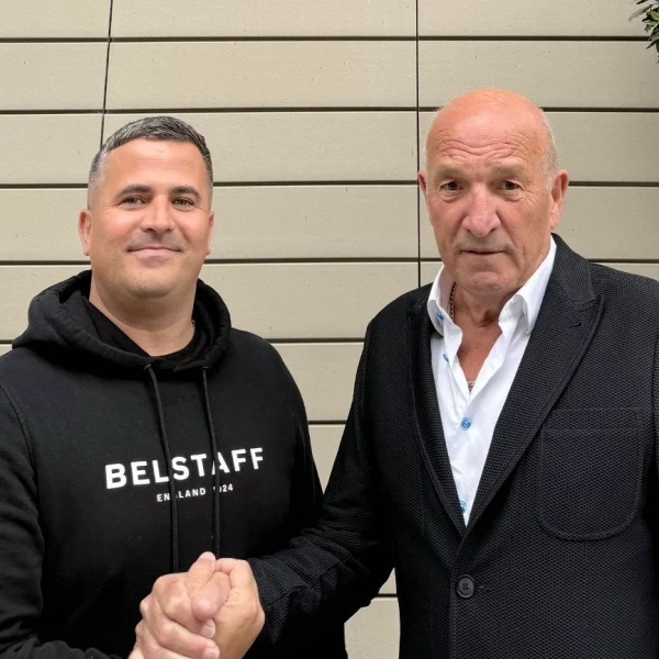 Mike-Walsh-and-Nigel-Barnett-of-TAL-Group-shaking-hands