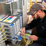Openreach-2024-FTTP-Exchange-Engineer-Working-on-Rack