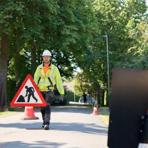 Netomnia-UK-Engineer-walking-on-road