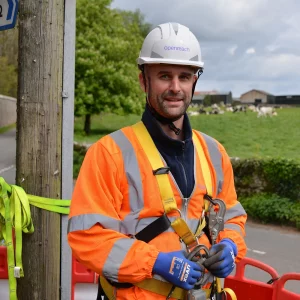 openreach-2024-engineer-next-to-broadband-pole
