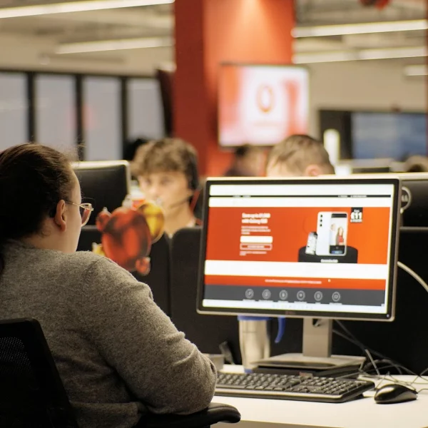Concentrix Vodafone Three customer support staff in office