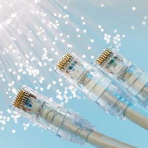 RJ45 UTP LAN network on background of optical fibres by 123rf ID91792658