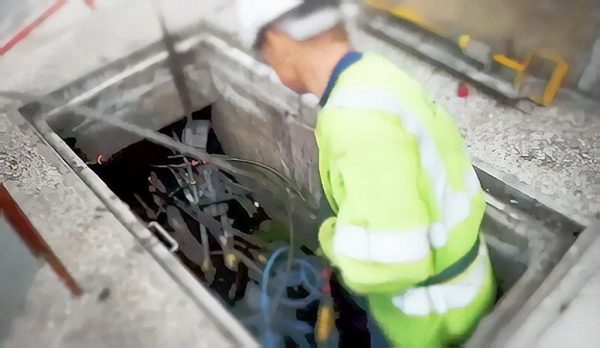 bt openreach fibre optic engineer in cable duct