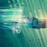 network cables closeup with fibre optical background by 123rf