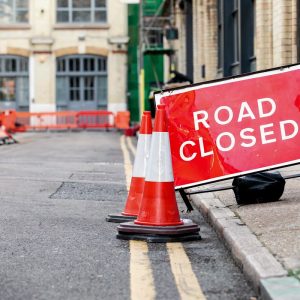 Red Road Closed road sign in a UK city street.