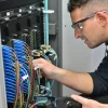 2025 Openreach engineer testing connections in exchange PR 200125