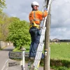 2025 Openreach FTTP engineer up pole for Project Gigabit