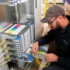 Openreach-2024-FTTP-Exchange-Engineer-Working-on-Rack